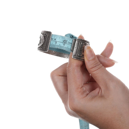 6.25" Gilbert "Dino" Garcia Santo Domingo pueblo tufa cast silver cuff bracelet - Estate Fresh Austin