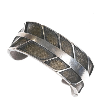 6.25" Ric Charlie Navajo Tufa Cast silver feather cuff bracelet - Estate Fresh Austin