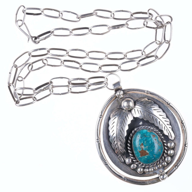 Vintage Navajo Spinner pendant Sterling, turquoise, and coral