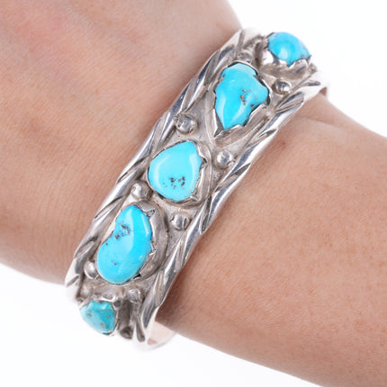 6.5" Vintage Zuni carved turquoise silver bracelet