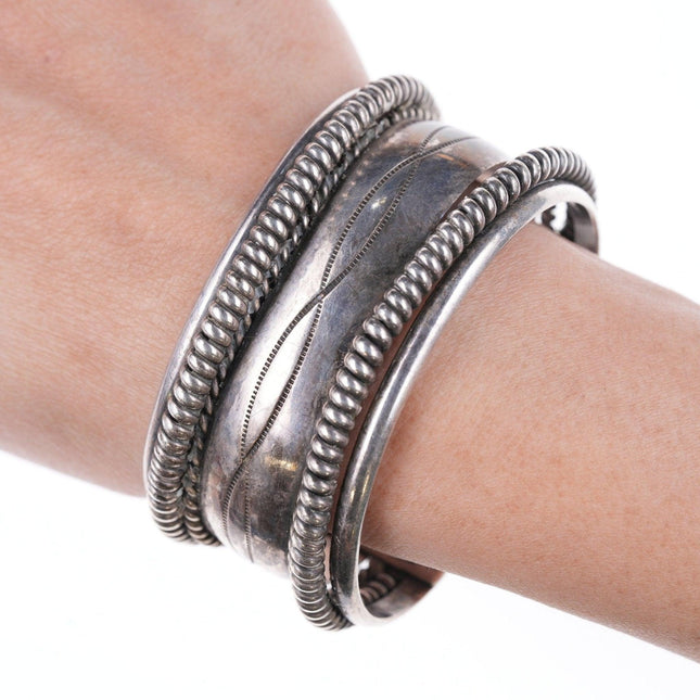 6.75" Tahe Navajo stamped silver twisted wire bracelet