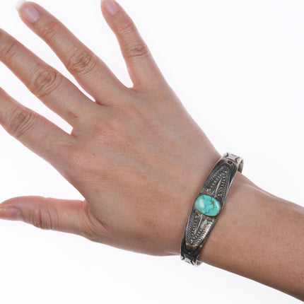 6.75" 30's-40's Navajo silver and turquoise bracelet with stars stampings