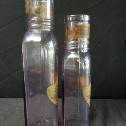 Price Booker San Antonio Texas Sun Colored Amethyst Pickle Bottles Embossed With