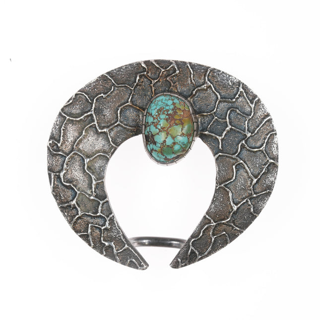 Samuel LaFountain - Diné, Turtle Mountain Chippewa Tufa Cast silver turquoise pendant/bolo