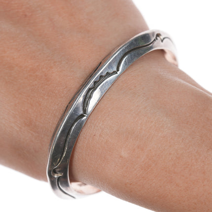 6.75" Orville Tsinnie Navajo hand stamped silver cuff bracelet
