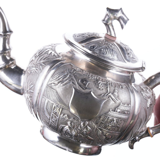 Antique chinese export silver teapot with amazing repousse work