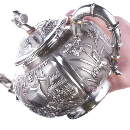 Antique chinese export silver teapot with amazing repousse work