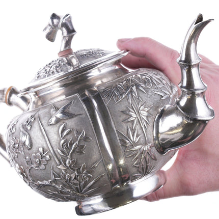 Antique chinese export silver teapot with amazing repousse work