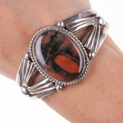 6.5" 1940's Navajo Repousse/stamped silver petrified wood bracelet