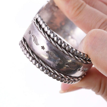 Vintage 6.75" Navajo stamped silver twisted wire bracelet