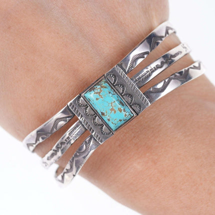 c1940's Navajo Silver Stamped cuff bracelet with whirling logs and turquoise cen