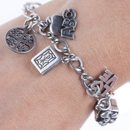 7.75" James Avery Sterling silver Charm bracelet with lots of charms