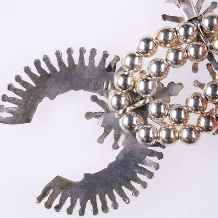 Zuni-Halskette aus Sterlingsilber und Türkis mit Petit-Point-Kürbisblüten