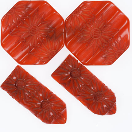 c1940's Deep carved Orange bakelite buckle and dress clip set