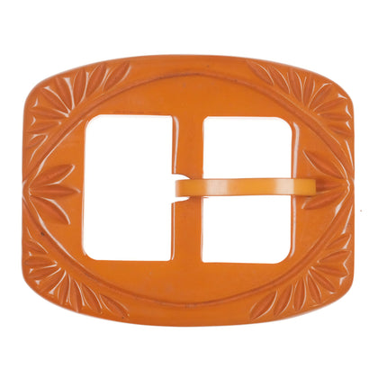 c1940's carved butterscotch bakelite belt buckle