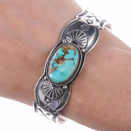 6.75" Gary Reeves (1962-2014) Navajo heavy stamped silver and turquoise bracelet