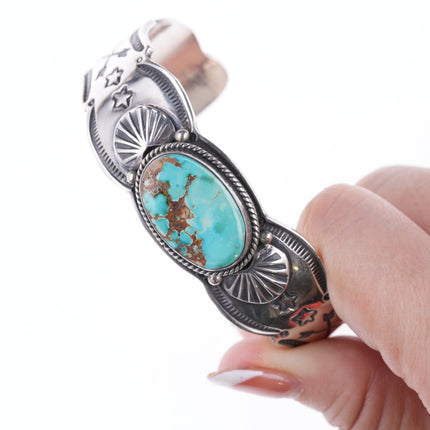 6.75" Gary Reeves (1962-2014) Navajo heavy stamped silver and turquoise bracelet