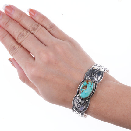 6.75" Gary Reeves (1962-2014) Navajo heavy stamped silver and turquoise bracelet