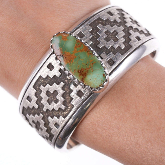 Dan Jackson (1944-2022) Navajo rug tufa cast bracelet with Ajax turquoise