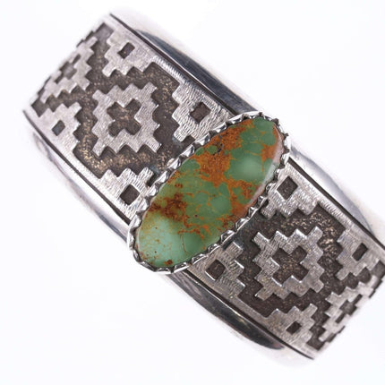 Dan Jackson (1944-2022) Navajo rug tufa cast bracelet with Ajax turquoise