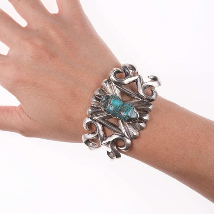 Leekya Deyuse (1889-1966) Zuni Carved turquoise  Cast silver bracelet