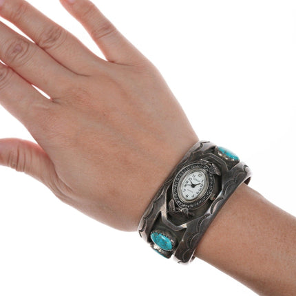 กำไลข้อมือนาฬิกาสีเงินและเทอร์ควอยซ์ประทับตรานาวาโฮขนาด 6 นิ้ว