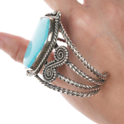 6.5" Liz Wallace (Diné-Washoe-Maidu) Twisted sterling wire and turquoise bracele