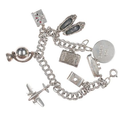 6.5" Vintage Sterling charm bracelet with airplane and others