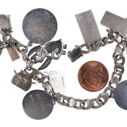 1960's Danecraft, Lang, Wells sterling charm bracelet