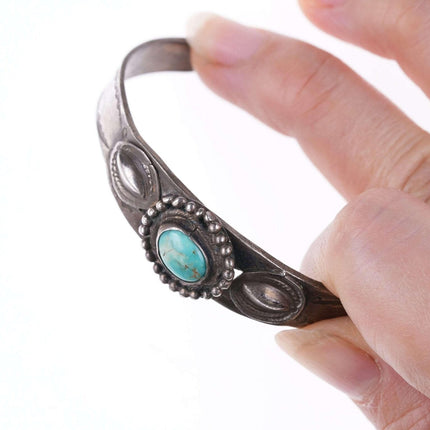 c1930's 6.5" Navajo stamped silver ring with turquoise