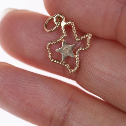 Retired James Avery 14k gold Texas Star charm with rope edge