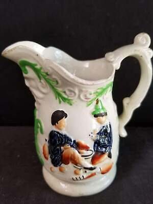 Staffordshire Pitcher Reliefgeformte Kinderspielkarten, frühes 19. Jahrhundert, 4 3/8" hoch x 3,75" mit Griff