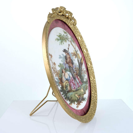 c1920 Porcelain plaque with courting scene in gilt metal frame