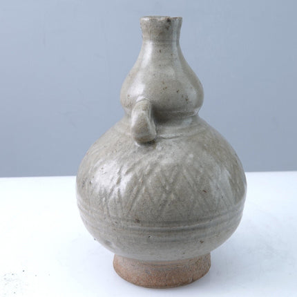 15th Century Thai Sawankhalok celadon Tall bottle or Vase with incised decoratio