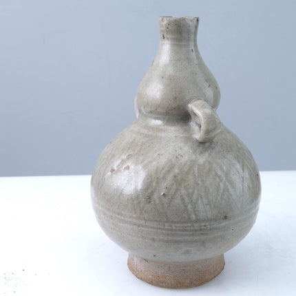 15th Century Thai Sawankhalok celadon Tall bottle or Vase with incised decoratio