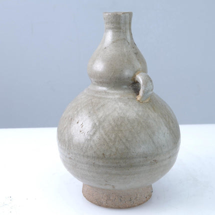 15th Century Thai Sawankhalok celadon Tall bottle or Vase with incised decoratio