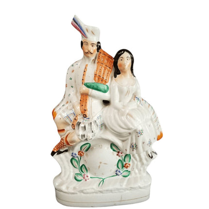 Antique Staffordshire Figure Highlander Couple with Clock c.1870 13.75" x 9" wid