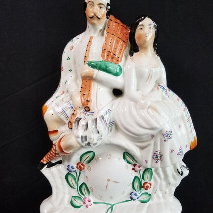 Antique Staffordshire Figure Highlander Couple with Clock c.1870 13.75" x 9" wid