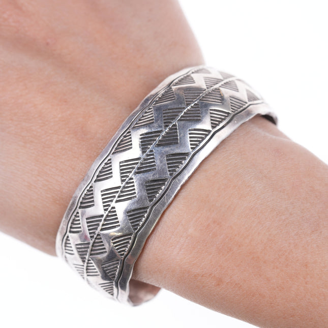 6.75" Douglas Etsitty  Navajo Stamped silver bracelet