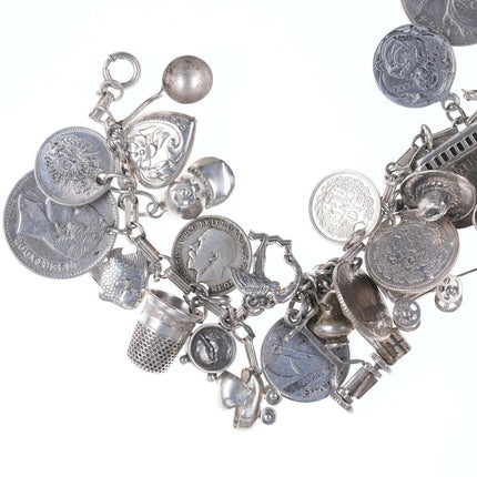 Loaded Vintage Super Traveler Sterling Silver world coins charm bracelet