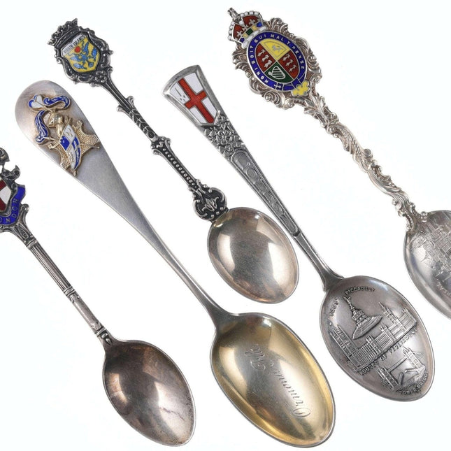 Collection sterling Enamel souvenir spoons from everywhere