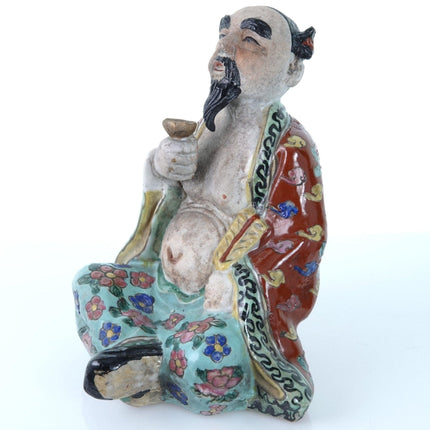 Antique Chinese Famille Rose Figure holding cup and Tablet