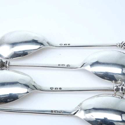 4 nice British sterling Spoons with intricate figures on top