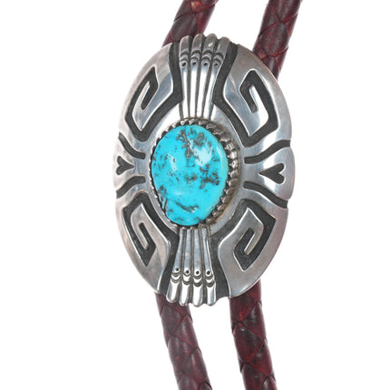 TOMMY SINGER Navajo (1940 – 2014) Large sterling bolo tie with turquoise