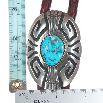 TOMMY SINGER Navajo (1940 – 2014) Large sterling bolo tie with turquoise