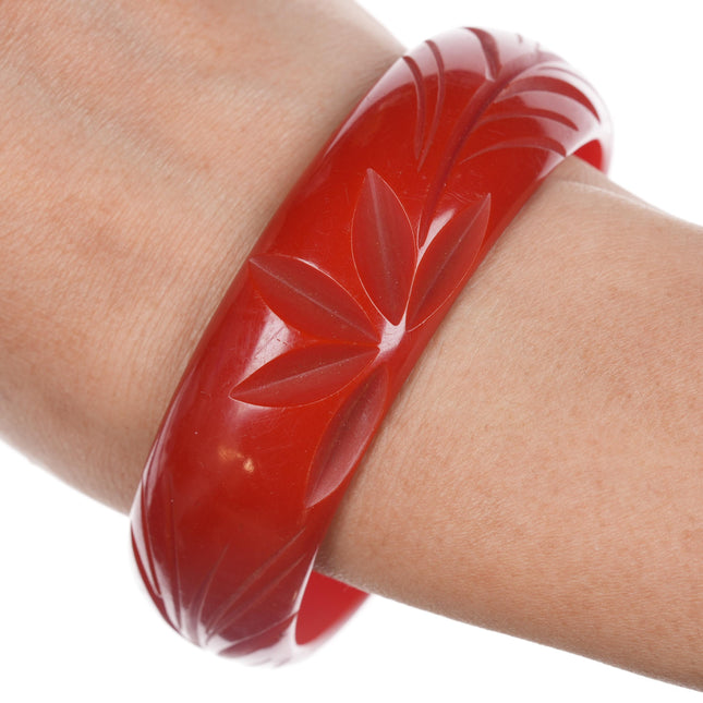 8" c1940's Carved red bakelite bangle