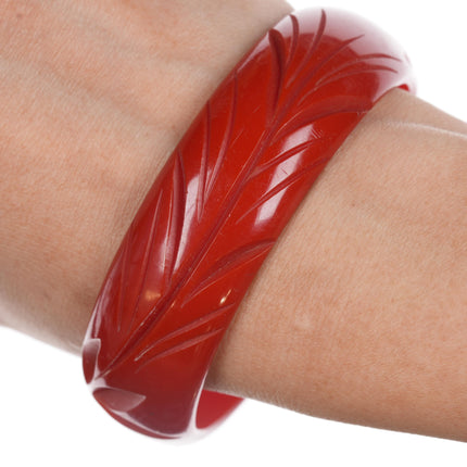 8" c1940's Carved red bakelite bangle