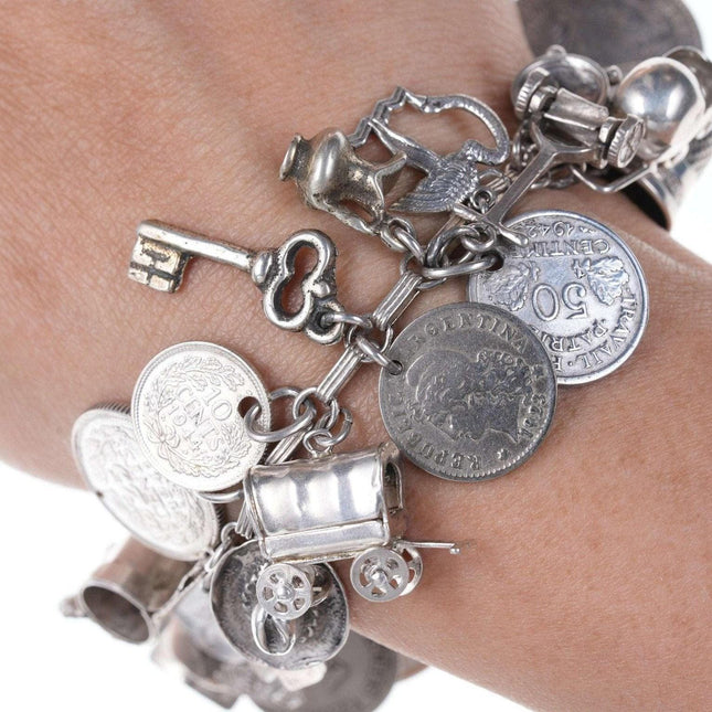 Loaded Vintage Super Traveler Sterling Silver world coins charm bracelet