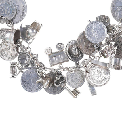 Loaded Vintage Super Traveler Sterling Silver world coins charm bracelet