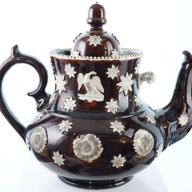 Huge 19th century treacle glazed teapot with eagle